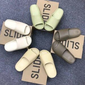 Yeezy Slides in Onyx – stylish and comfortable footwear.